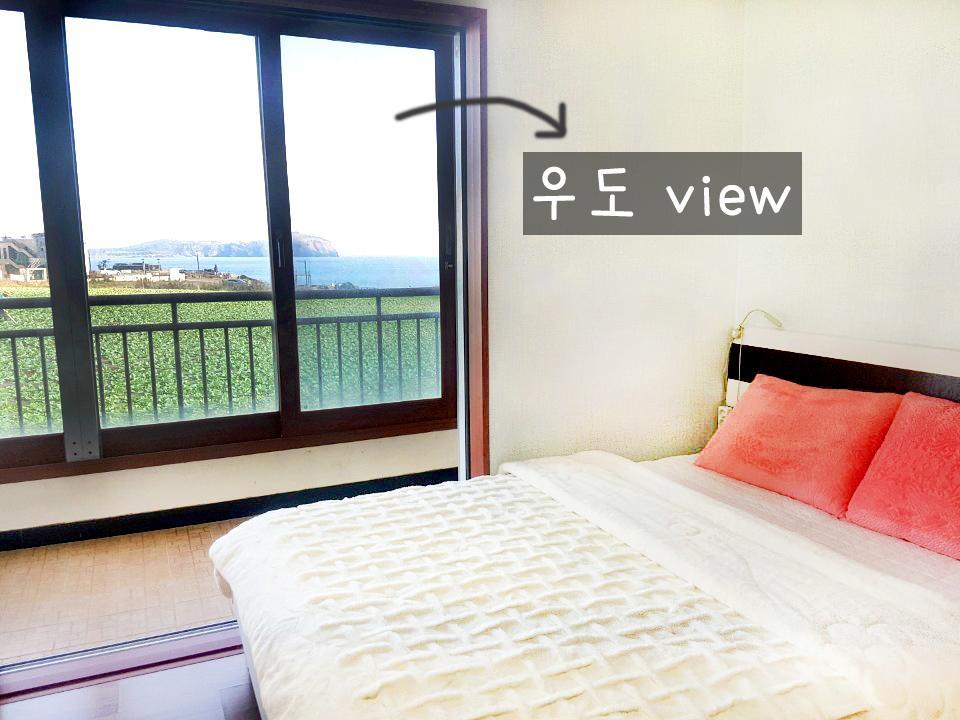 Longisland Guesthouse Seogwipo Quarto foto